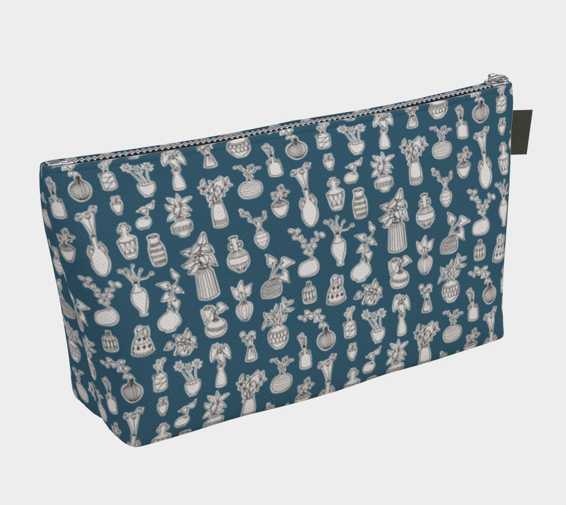 Large Carry All Make Up Bag with denim lining. Blue plant doodle pattern. Back view.