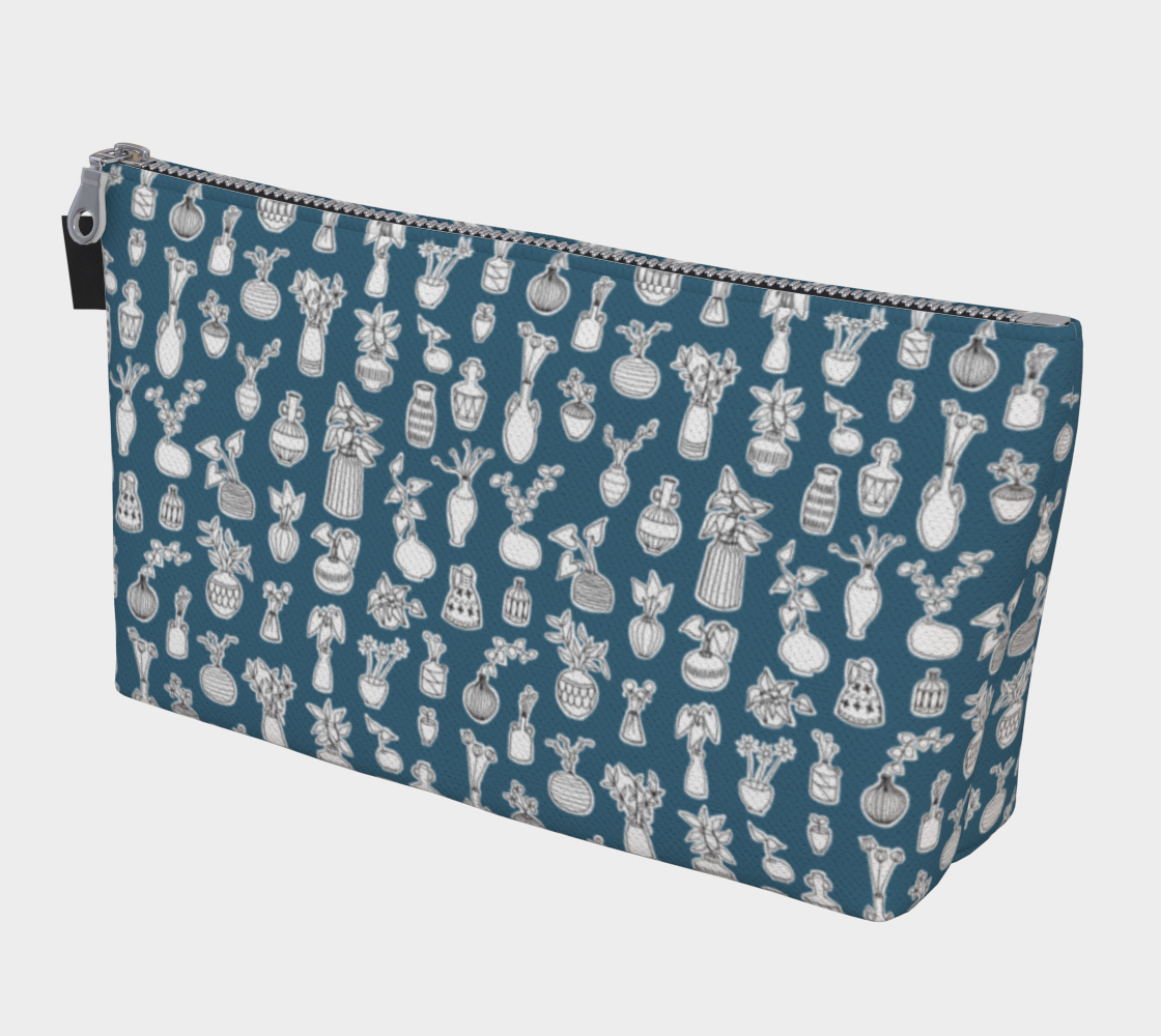 Large Carry All Make Up Bag with denim lining. Blue plant doodle pattern. Front view.