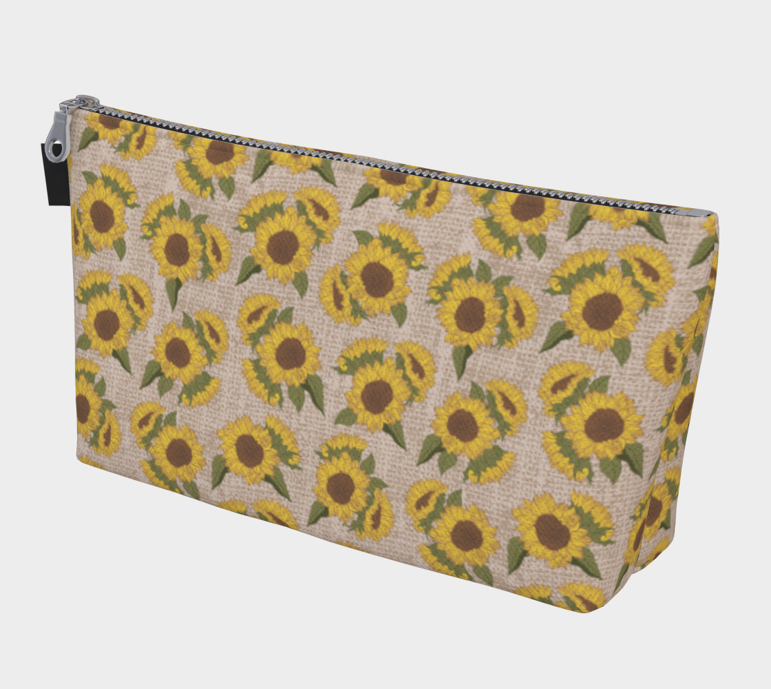 Large Carry All Make Up Bag with denim lining. Sunflower floral pattern. Front view.