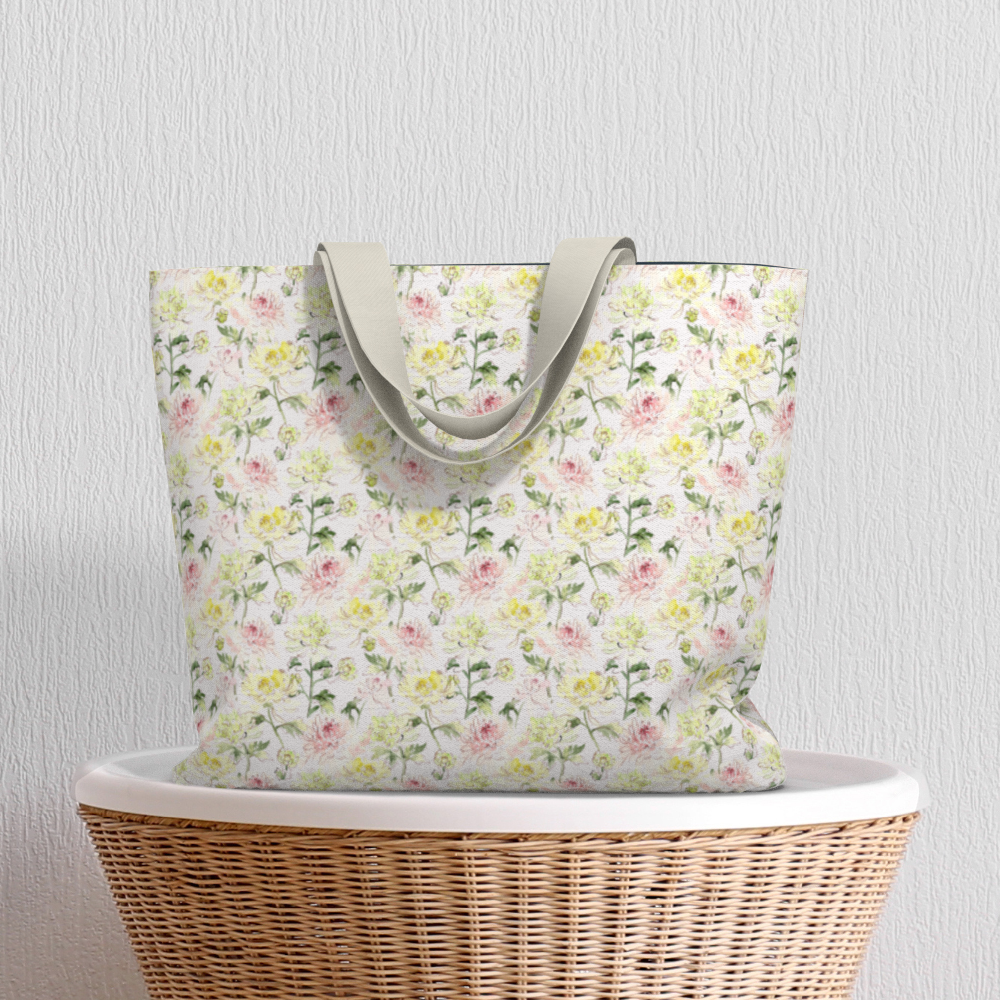 Oversized Fully Lined Cotton Tote Bag with sturdy 1 ½ inch strap. Chrysanthemum floral pattern. Shown on wicker basket.