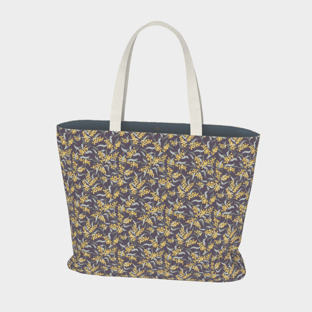 Oversized Fully Lined Cotton Tote Bag with sturdy 1 ½ inch strap. Floral botanical pattern featuring sage green leaves and yellow blossoms on a muted purple background. Back view.