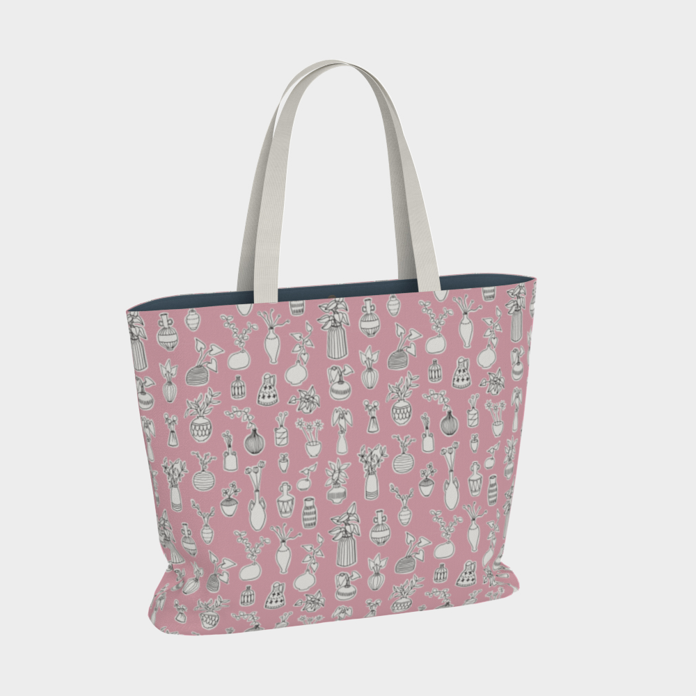 Oversized Fully Lined Cotton Tote Bag with sturdy 1 ½ inch strap. Whimsical pink pattern featuring doodles of house plants. Front view.