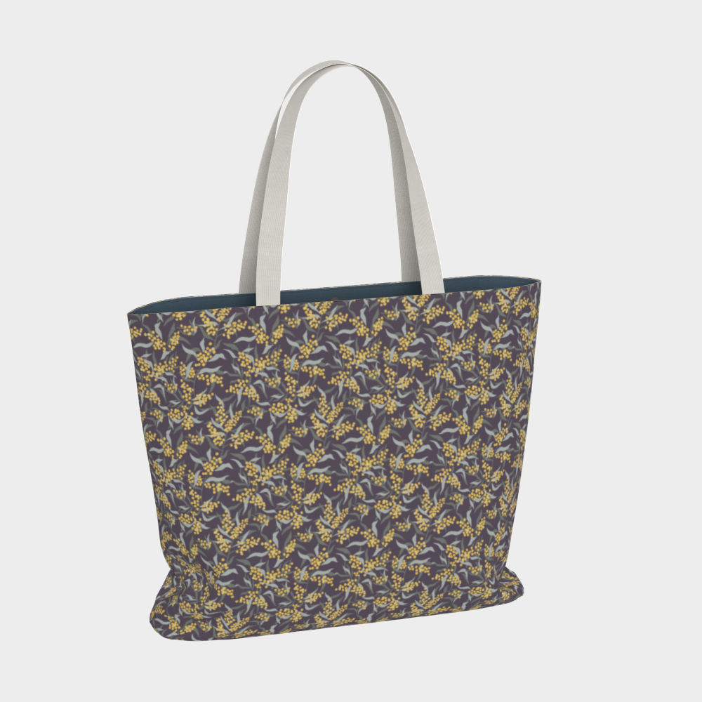 Oversized Fully Lined Cotton Tote Bag with sturdy 1 ½ inch strap. Floral botanical pattern featuring sage green leaves and yellow blossoms on a muted purple background. Front View. Front view.